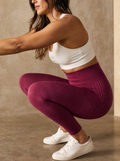 Contoura Leggings in Crimson Plum — fabric opacity proof
