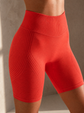 Contoura Shorts in Orange — waistband and hem detail