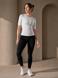 Contoura T-Shirt in White — styled with leggings