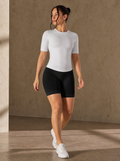 Contoura T-Shirt in White — styled with shorts